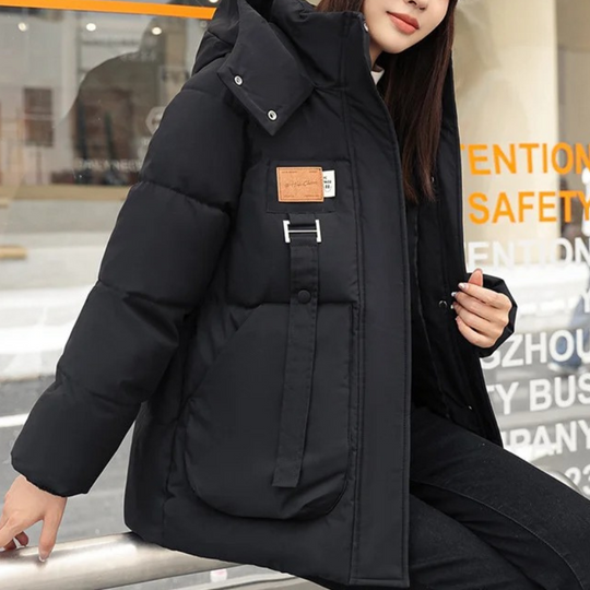 Felubra - Daunenjacke Damen – Warme Winterjacke mit Kapuze und modernem Design